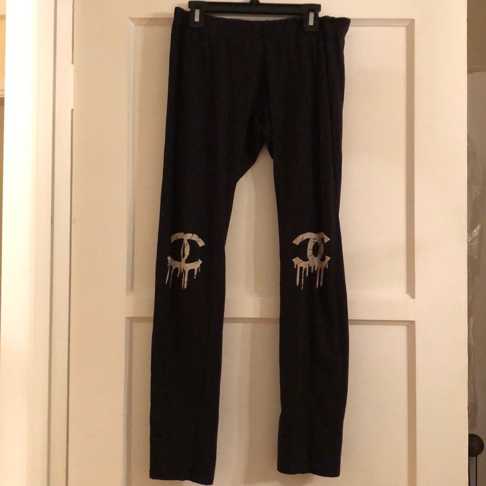 Black leggings with Chanel logo